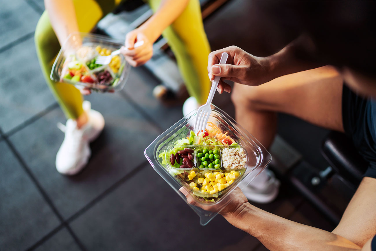 Two People Eating Healthy Food Together