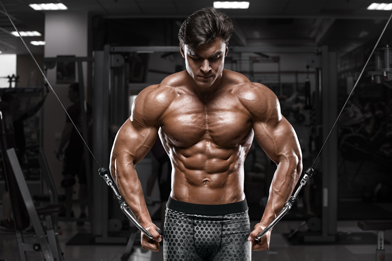 Muscular Guy Doing Cable Pullovers