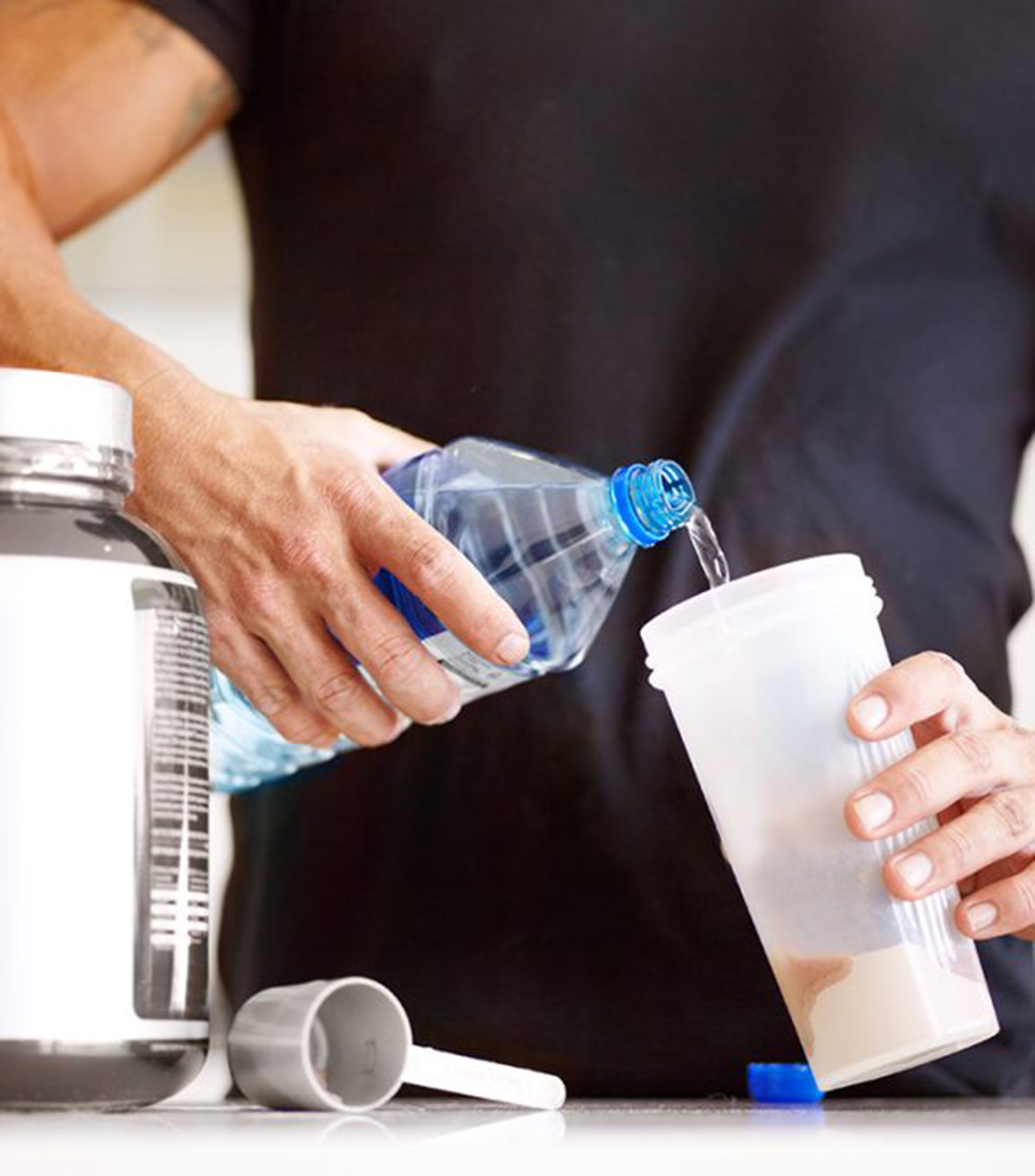 Guy Making a Protein Shake